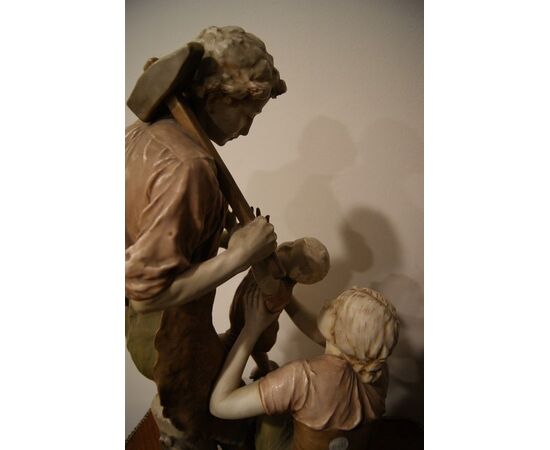 Antique large Royal Dux Bohemia porcelain sculpture from the 1800s depicting a traditional family