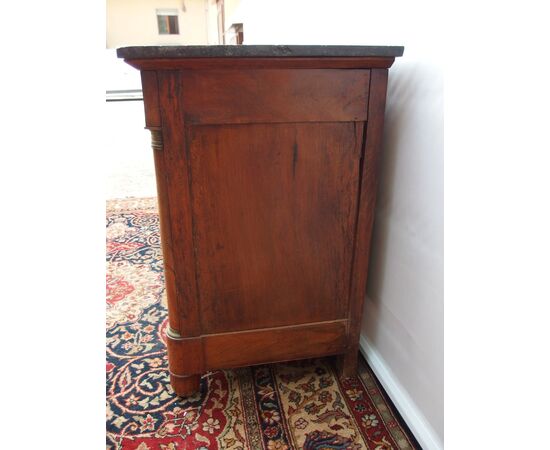 Empire style walnut chest of drawers with black marble, 19th century