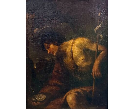 Saint John the Baptist in the desert, an oil painting on canvas from the 17th century.