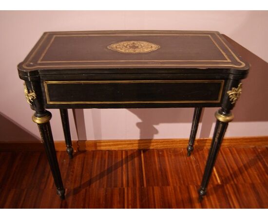Antique French Boulle style game table from the 1800s in ebonized wood with brass inlays and bronzes