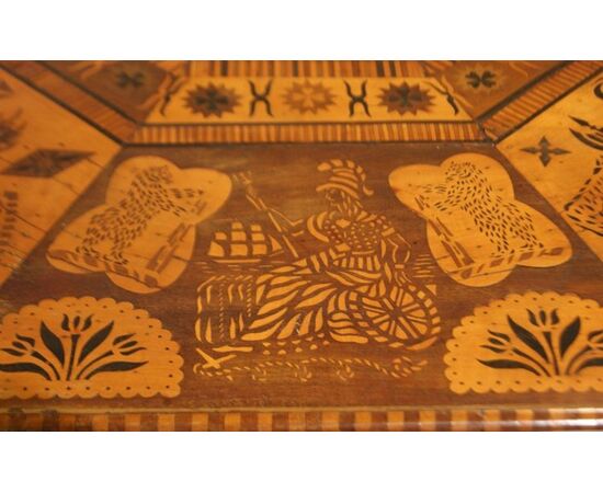 Antique English table with exotic taste from the 1800s, richly inlaid with animals and figures