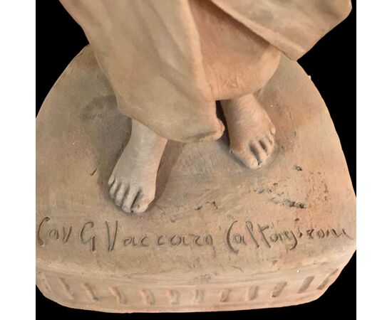 Coppia di sculture in terracotta raffigurante contadini.Firma Cav.G.Vaccaro.(1807-1889)Caltagirone.