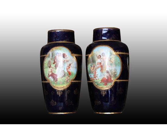 Pair of Austrian Vienna Manufacture porcelain vases with neo-classical scenes.