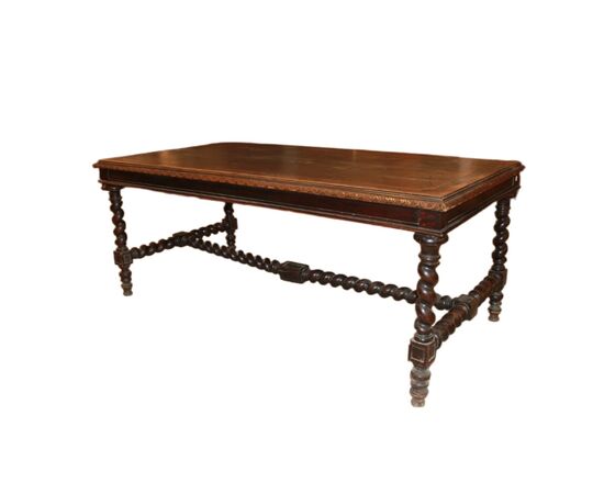 Large early 1800s French walnut table with carvings