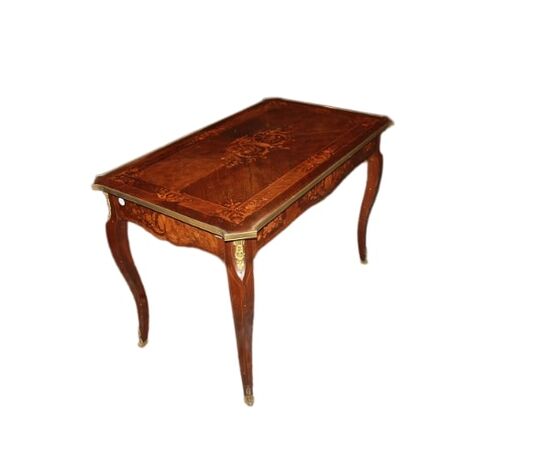 French Louis XV style desk from the 1800s with bronzes and rich marquetry motifs