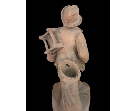 Coppia di sculture in terracotta raffigurante contadini.Firma Cav.G.Vaccaro.(1807-1889)Caltagirone.