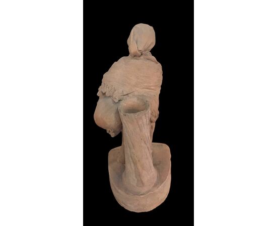 Coppia di sculture in terracotta raffigurante contadini.Firma Cav.G.Vaccaro.(1807-1889)Caltagirone.