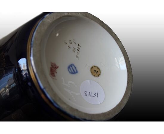 Pair of Austrian Vienna Manufacture porcelain vases with neo-classical scenes.