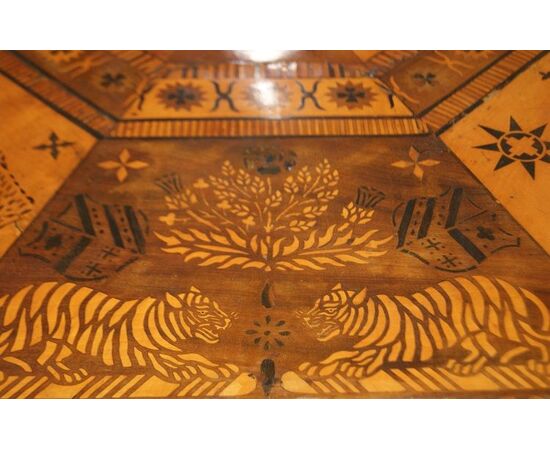 Antique English table with exotic taste from the 1800s, richly inlaid with animals and figures
