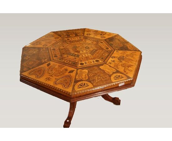 Antique English table with exotic taste from the 1800s, richly inlaid with animals and figures
