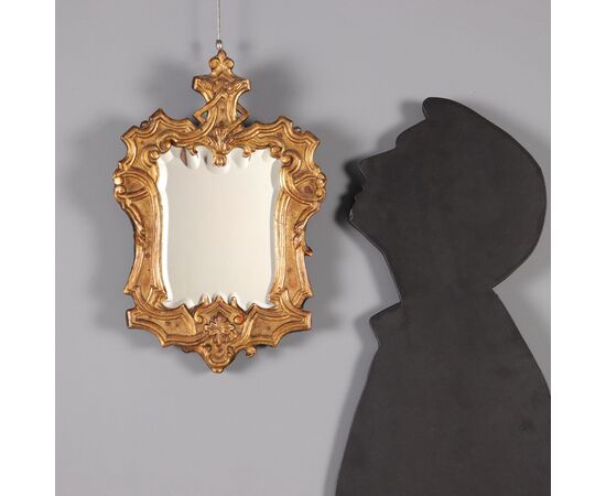 Louis XIV carved and gilded wood mirror, Italy, first quarter of the 18th century