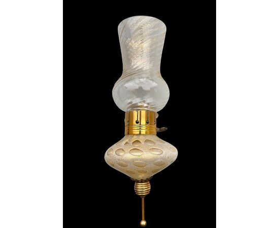 Heavy glass wall lamp with bubble inclusions, milk glass, and gold leaf. Salviati manufacture. Murano.