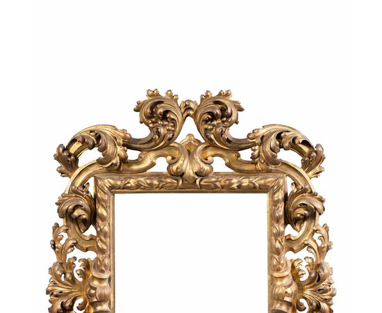 Large Baroque style frame in carved and gilded wood. Bologna, late 19th century.