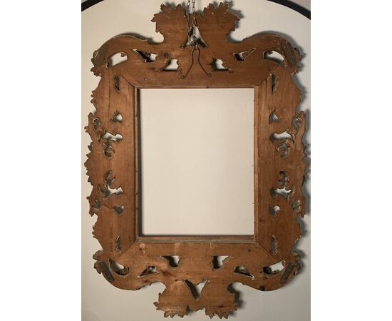 Large Baroque style frame in carved and gilded wood. Bologna, late 19th century.