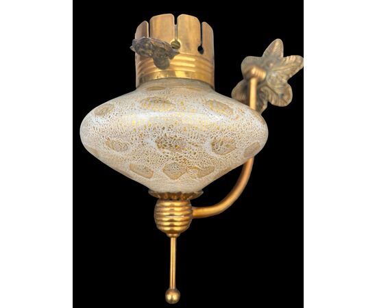 Heavy glass wall lamp with bubble inclusions, milk glass, and gold leaf. Salviati manufacture. Murano.