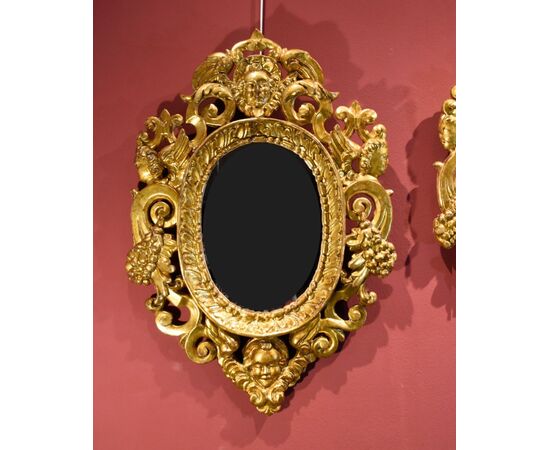 Pair of carved and gilded mirrors 'alla Sansovino', Venice 18th century