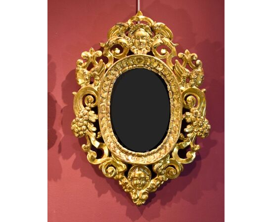 Pair of carved and gilded mirrors 'alla Sansovino', Venice 18th century