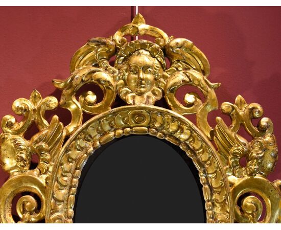 Pair of carved and gilded mirrors 'alla Sansovino', Venice 18th century