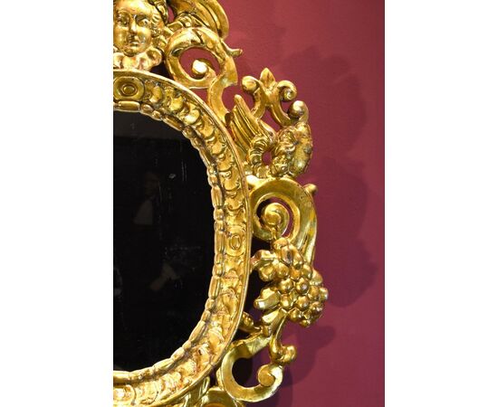 Pair of carved and gilded mirrors 'alla Sansovino', Venice 18th century