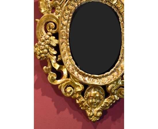 Pair of carved and gilded mirrors 'alla Sansovino', Venice 18th century