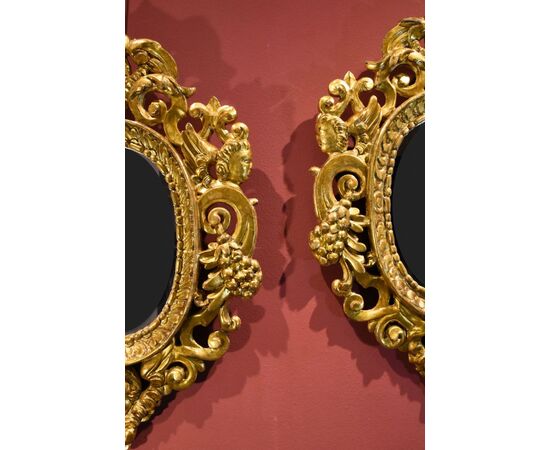 Pair of carved and gilded mirrors 'alla Sansovino', Venice 18th century