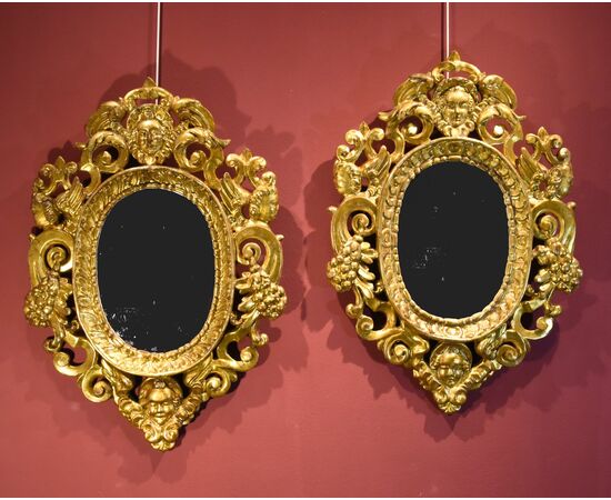 Pair of carved and gilded mirrors 'alla Sansovino', Venice 18th century