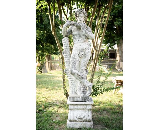 Putto with flute – Art Nouveau sculpture in grit, 1930s