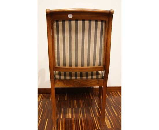 Beautiful French mahogany armchair from the 1800s, Directoire style, with striped fabric.