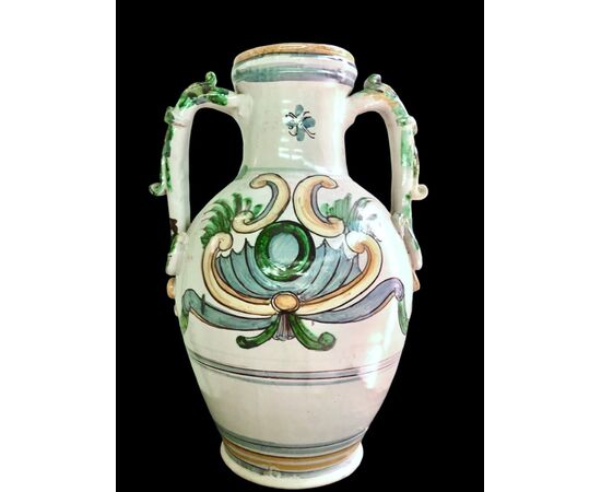 Two-handled majolica vase with rocaille decoration and stylized vegetal motifs. Caltagirone, Sicily.