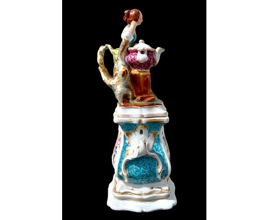 Figurative porcelain veilleuse with lady and floral decoration. France