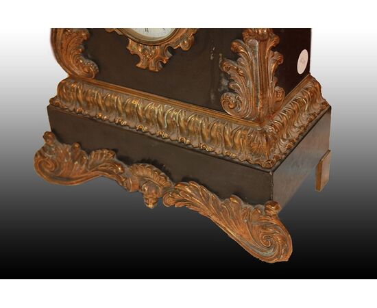 French marble table clock from the 1800s with bronze sculpture and friezes