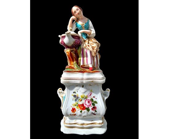 Figurative porcelain veilleuse with lady and floral decoration. France