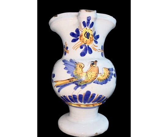 Maiolica jug in compendiario style, decorated with a bird and vegetal motifs. Urbania manufacture.