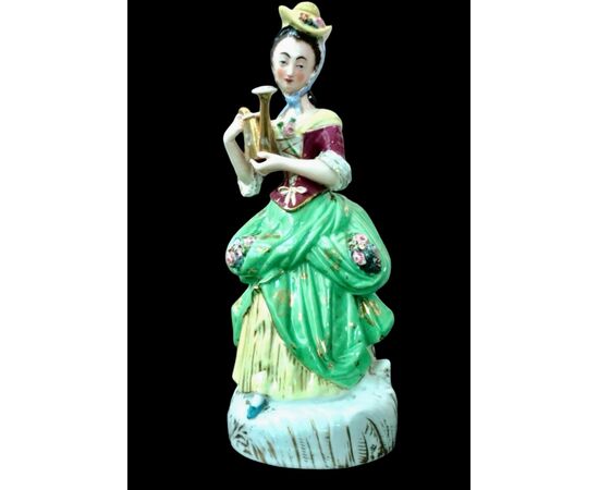 Polychrome porcelain veilleuse-teapoy depicting a lady with watering can. France