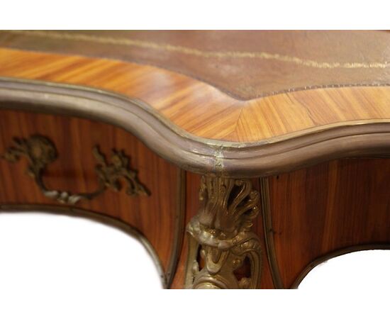 Shaped rosewood desk from 19th-century French Louis XV style