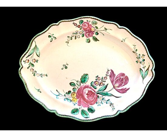 Majolica plate with rose decoration. Finck Manufacture. Bologna.