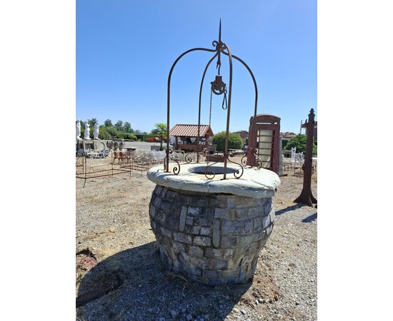 Stone well with iron arch