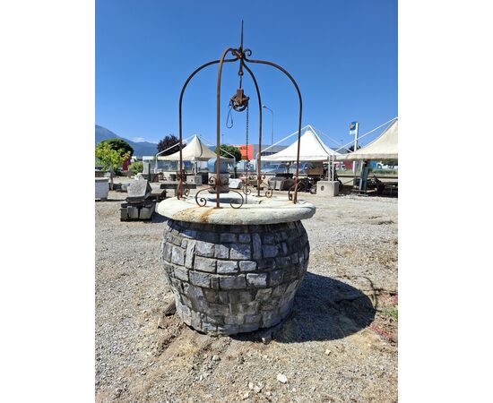 Stone well with iron arch