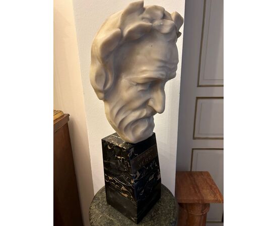 Head of Giuseppe Verdi in white marble