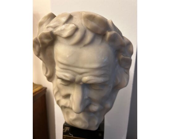 Head of Giuseppe Verdi in white marble