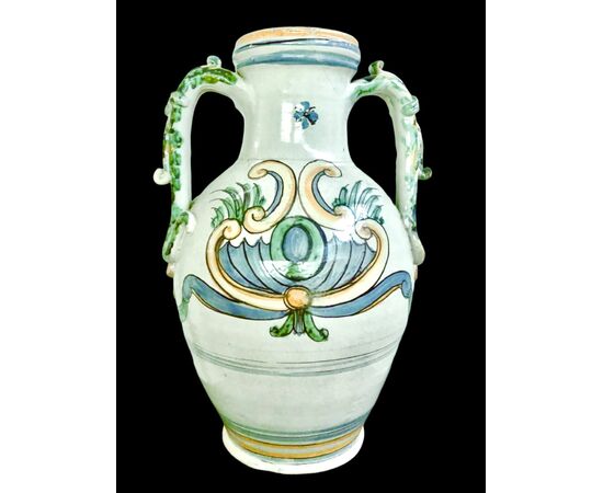 Two-handled majolica vase with rocaille decoration and stylized vegetal motifs. Caltagirone, Sicily.