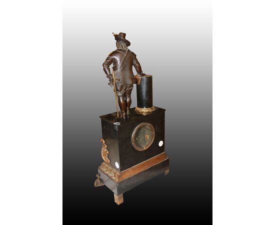French marble table clock from the 1800s with bronze sculpture and friezes