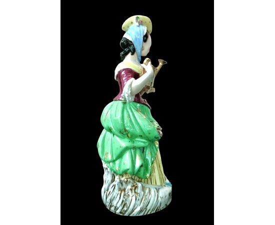 Polychrome porcelain veilleuse-teapoy depicting a lady with watering can. France