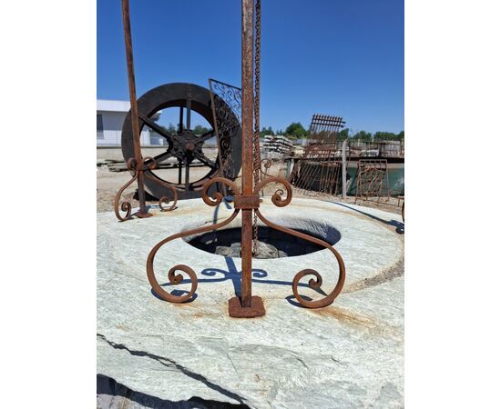 Stone well with iron arch