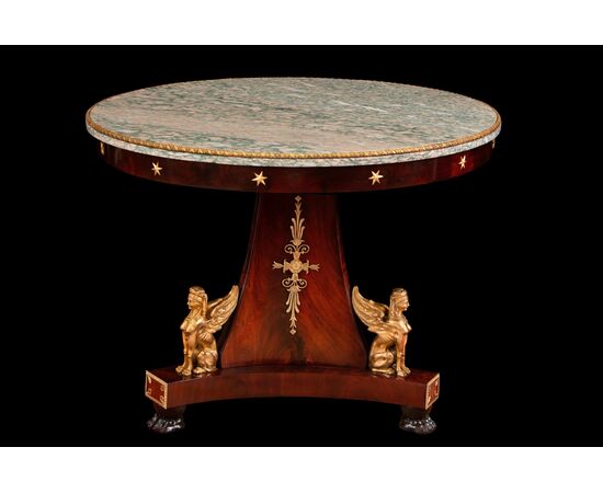 Circular mahogany feather table with marble top