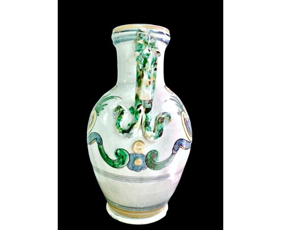 Two-handled majolica vase with rocaille decoration and stylized vegetal motifs. Caltagirone, Sicily.