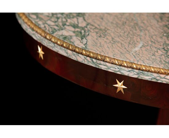Circular mahogany feather table with marble top