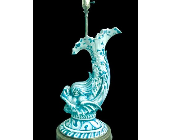 Majolica lamp depicting a mythological fish decorated in turquoise monochrome. Cantagalli Manufacture, Florence.