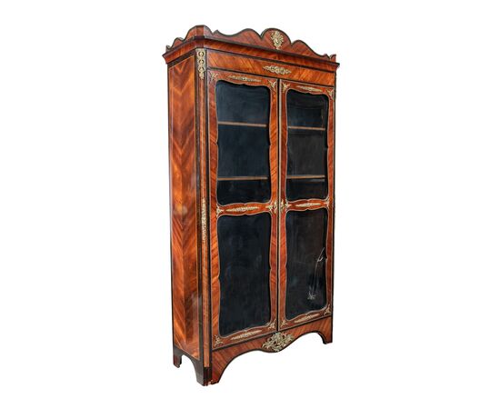 Showcase veneered in various woods. France, late 19th century.