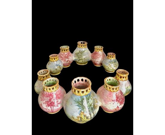 Centerpiece made up of two series of globular jars decorated with landscapes. Minghetti Bologna manufacture